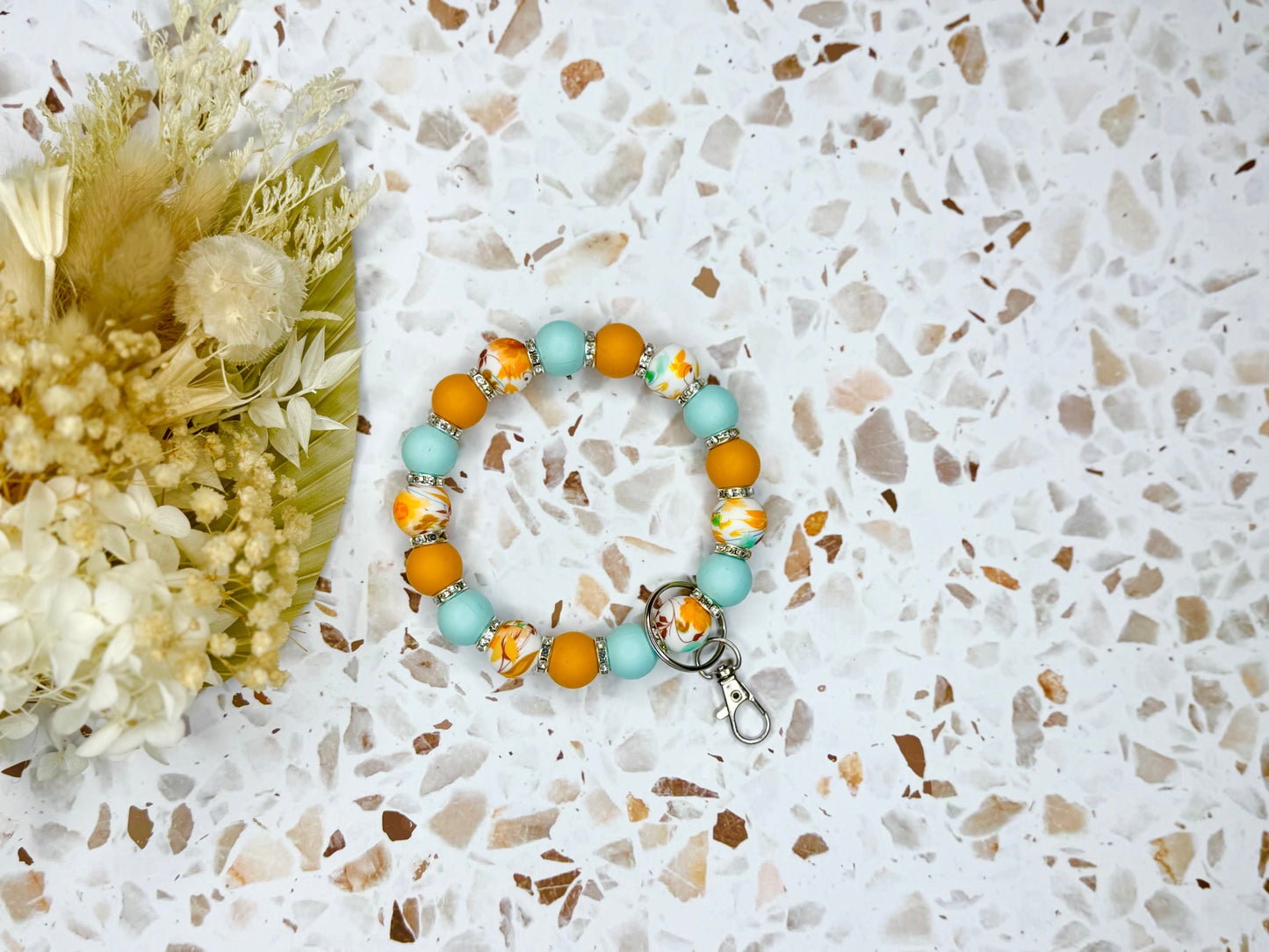 Floral Orange Wristlet